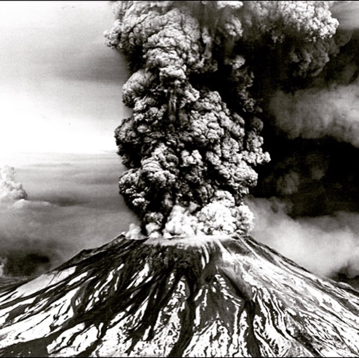 Mount St. Helens erupting on 18 May 1980, ash column rising from the crater